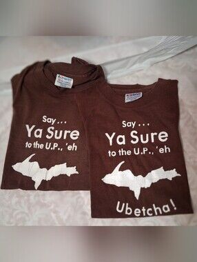 Two adult Michigan Upper Peninsula T-shirts printed with iconic phrase. Lrg&Sm